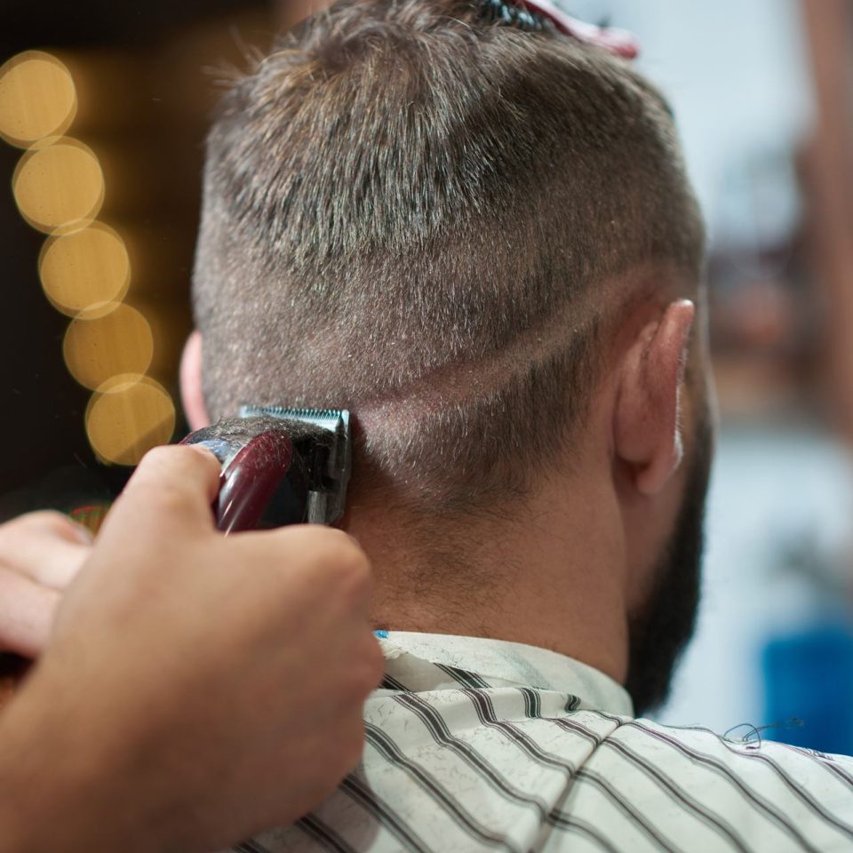 young-man-at-the-barbershop-R8325N8.jpg